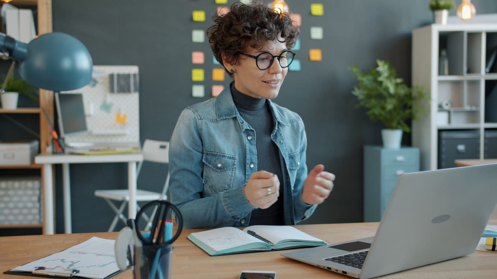 Woman on a one-on-one video call at her desk